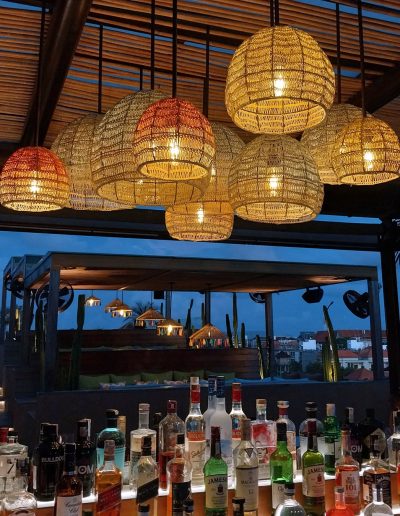 crochet pendant light at roof top bar